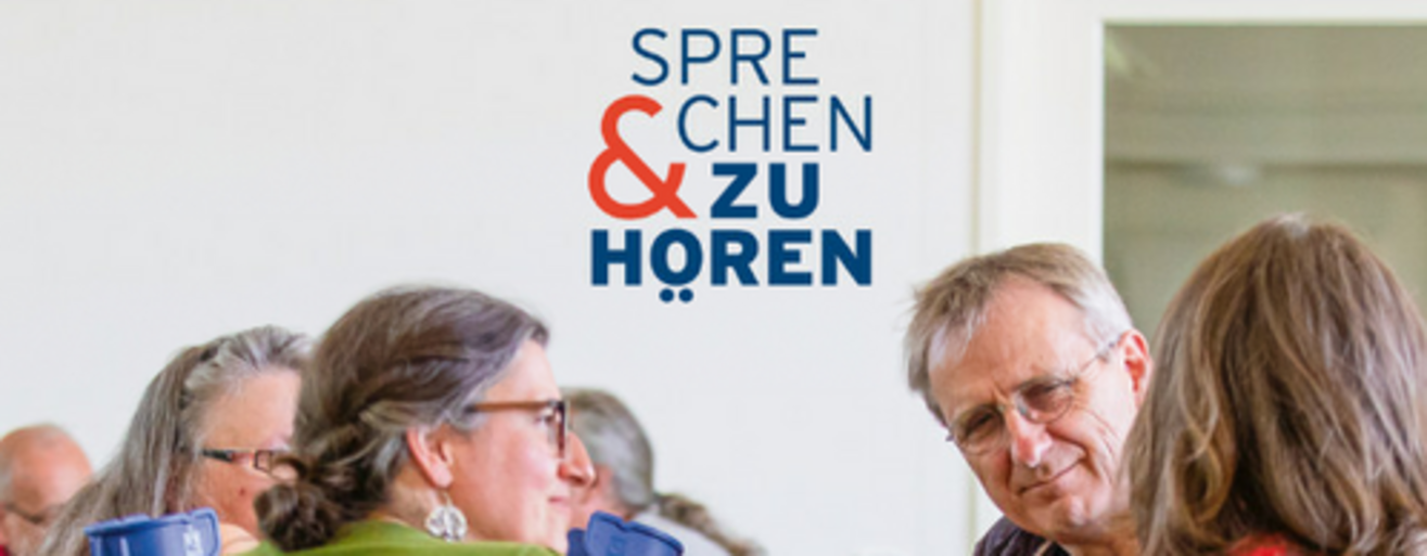 Gesprächsrunde, 4 Personen.