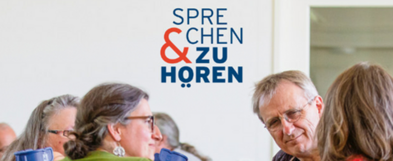 Gesprächsrunde, 4 Personen.